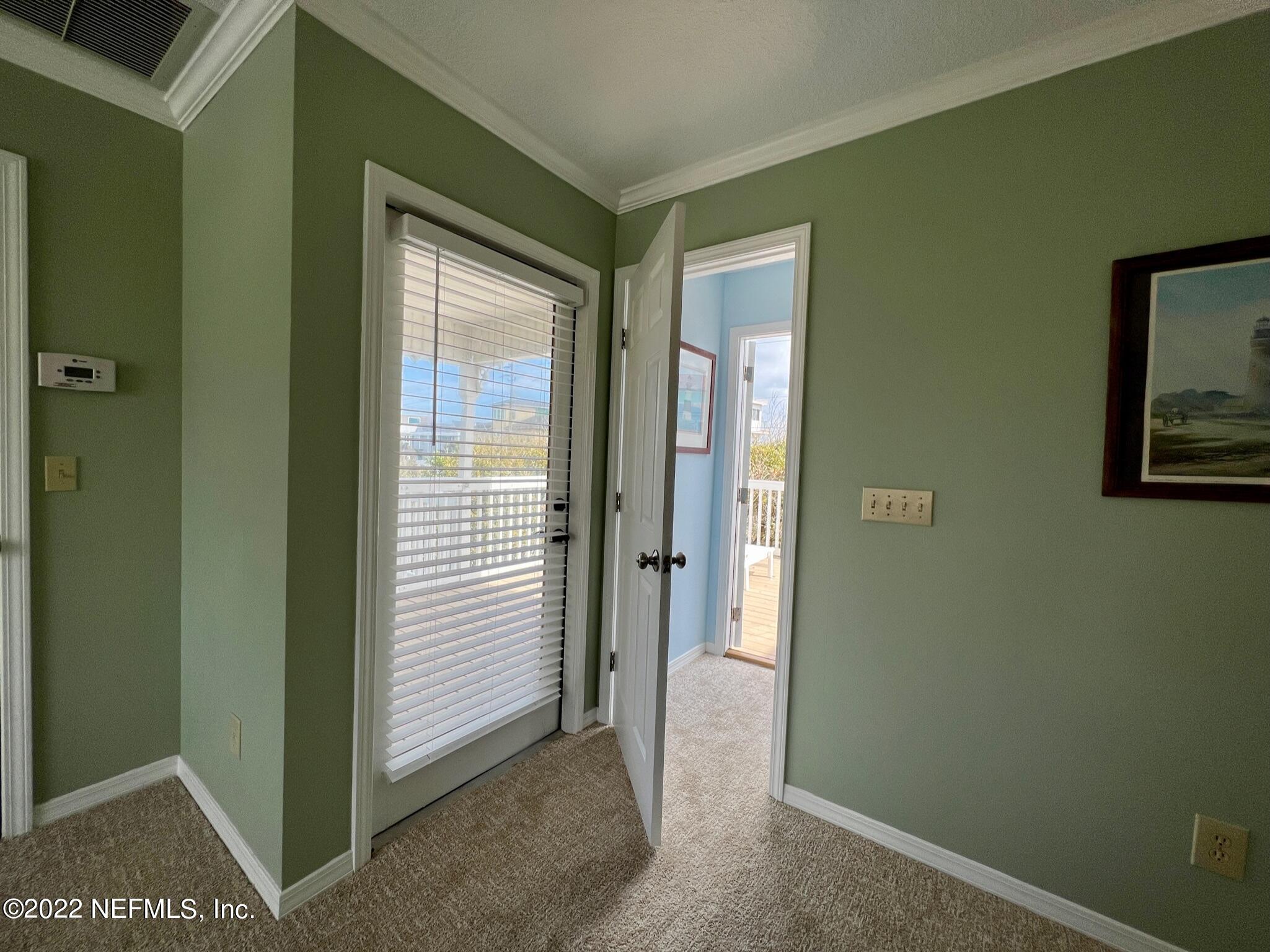 212 Gull Circle Ponte Vedra Beach, FL 32082 - Photo 21 of 49 a view of a room that has a large window