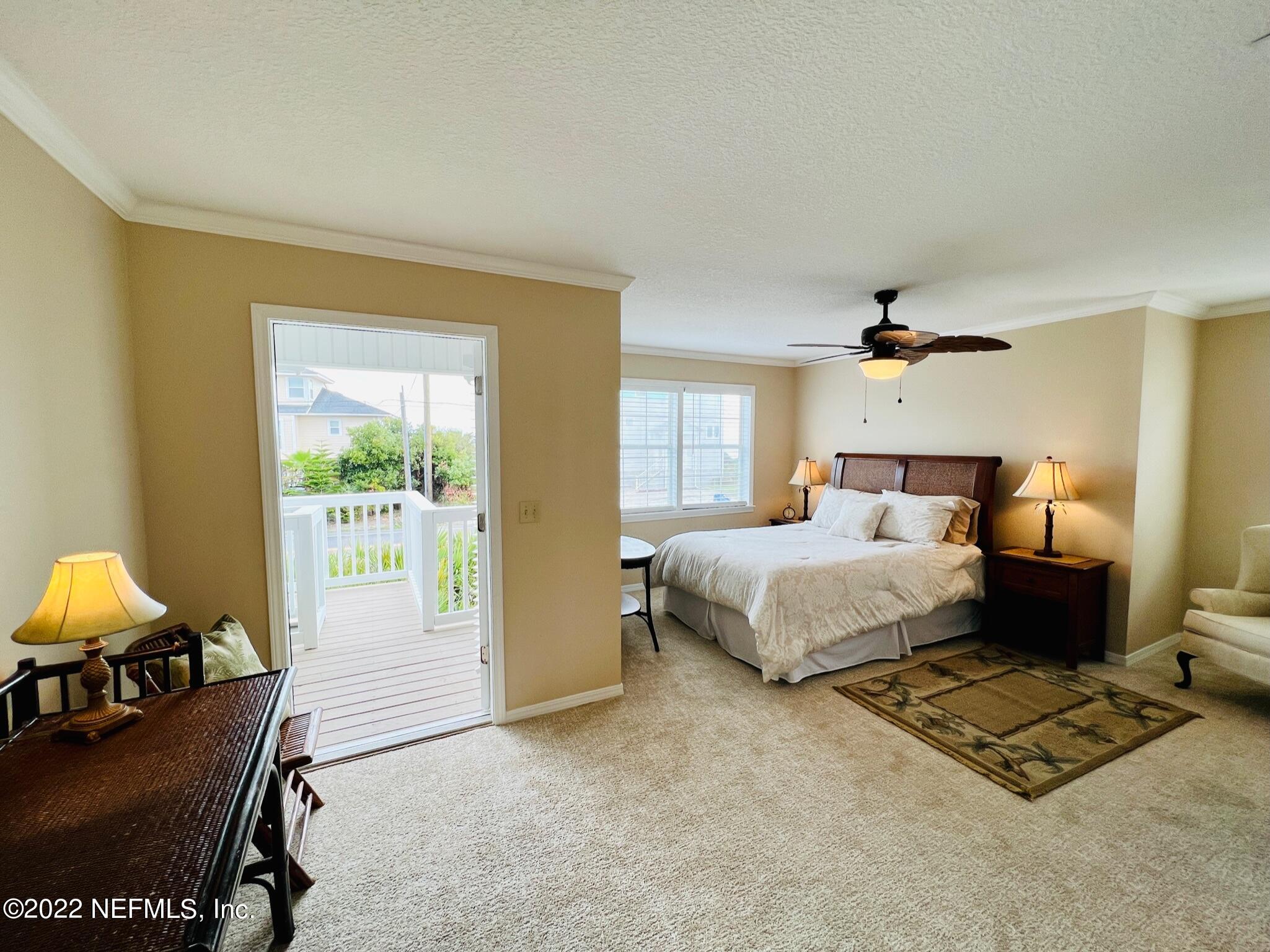 212 Gull Circle Ponte Vedra Beach, FL 32082 - Photo 24 of 49 a bedroom with a bed and wooden floor