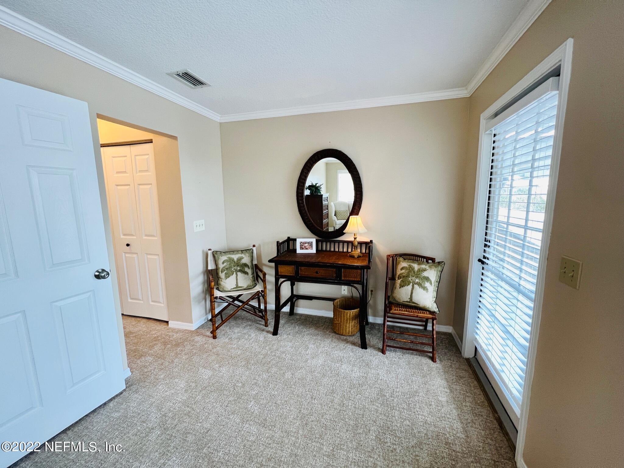 212 Gull Circle Ponte Vedra Beach, FL 32082 - Photo 25 of 49 a living room with furniture and a window