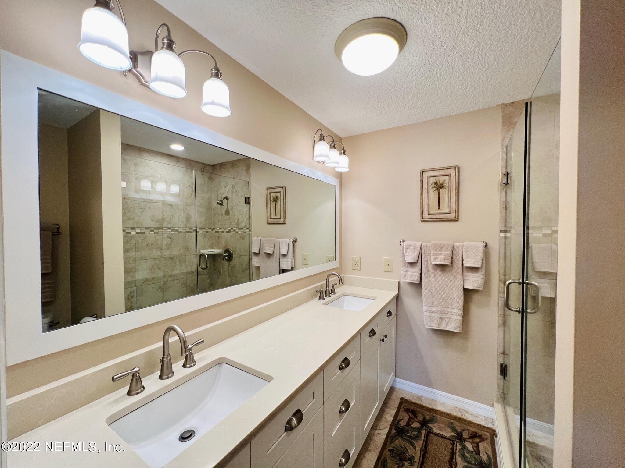 212 Gull Circle Ponte Vedra Beach, FL 32082 - Photo 26 of 49 a bathroom with a double vanity sink mirror and double