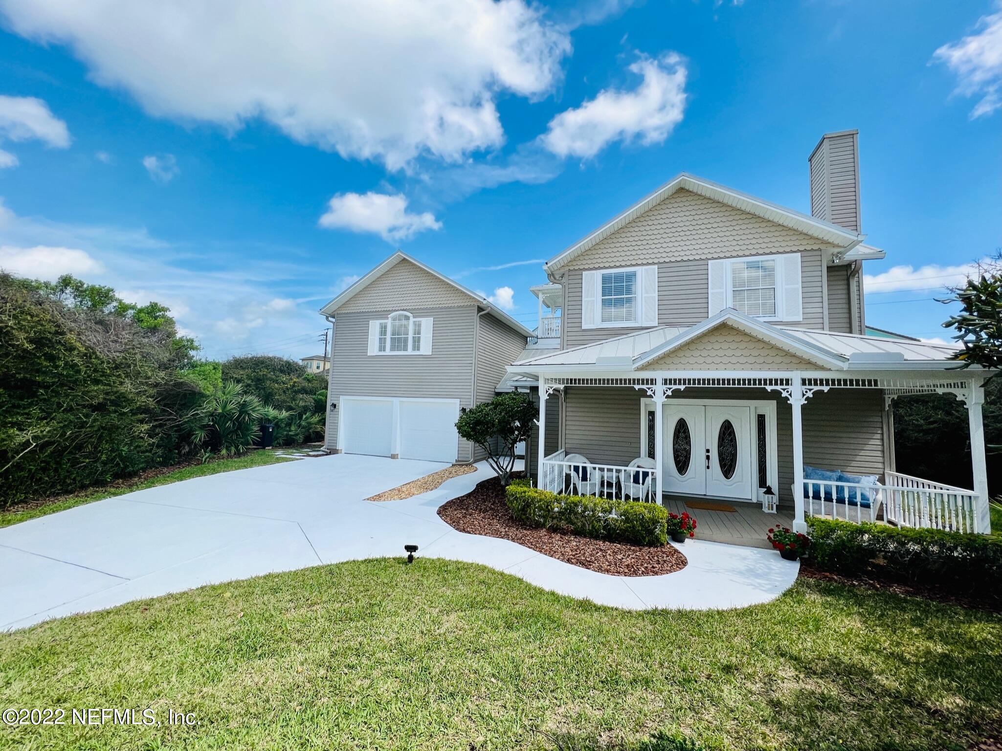 212 Gull Circle Ponte Vedra Beach, FL 32082 - Photo 3 of 49 a front view of a house with a yard