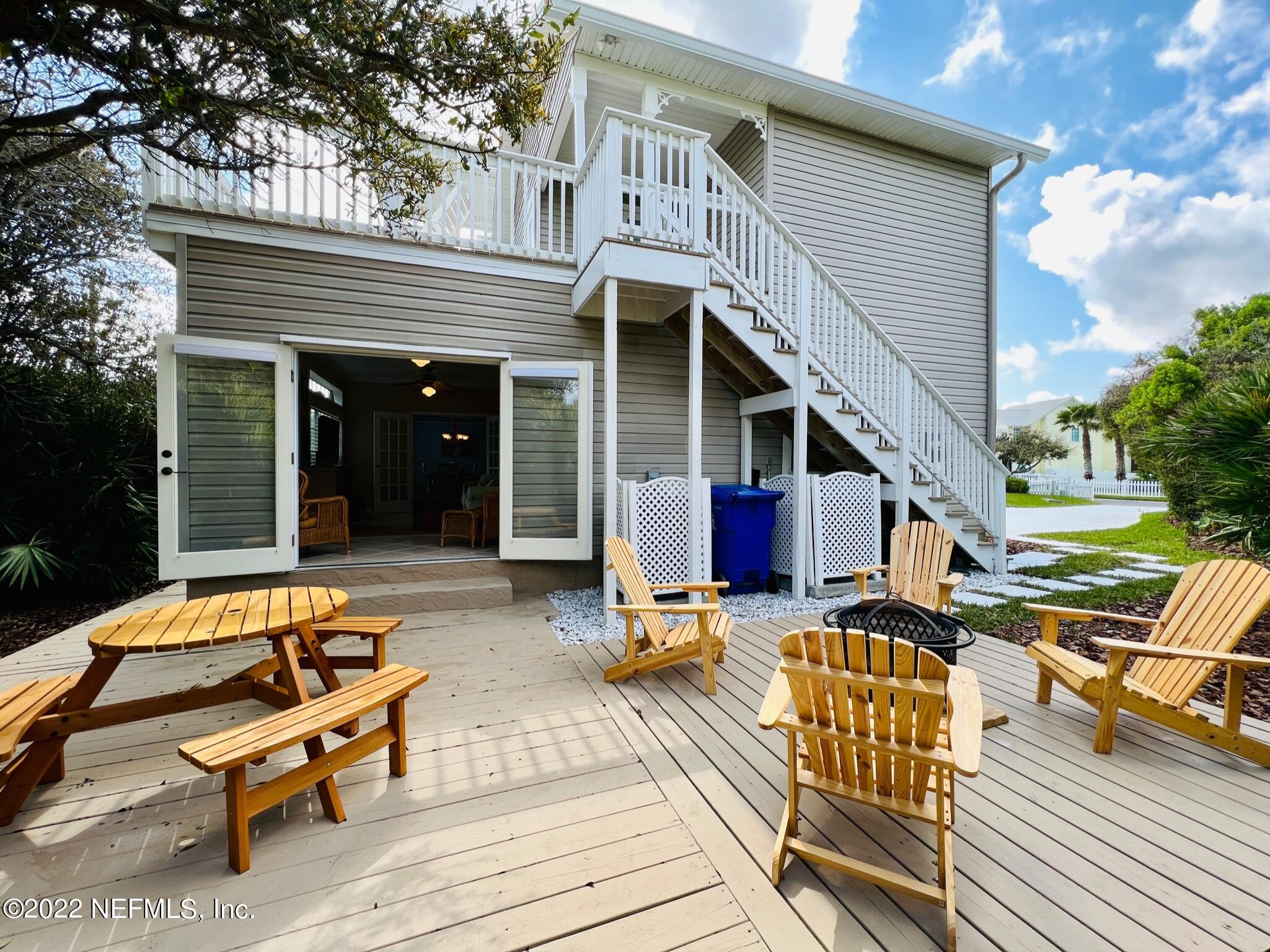 212 Gull Circle Ponte Vedra Beach, FL 32082 - Photo 34 of 49 a backyard of a house with outdoor seating
