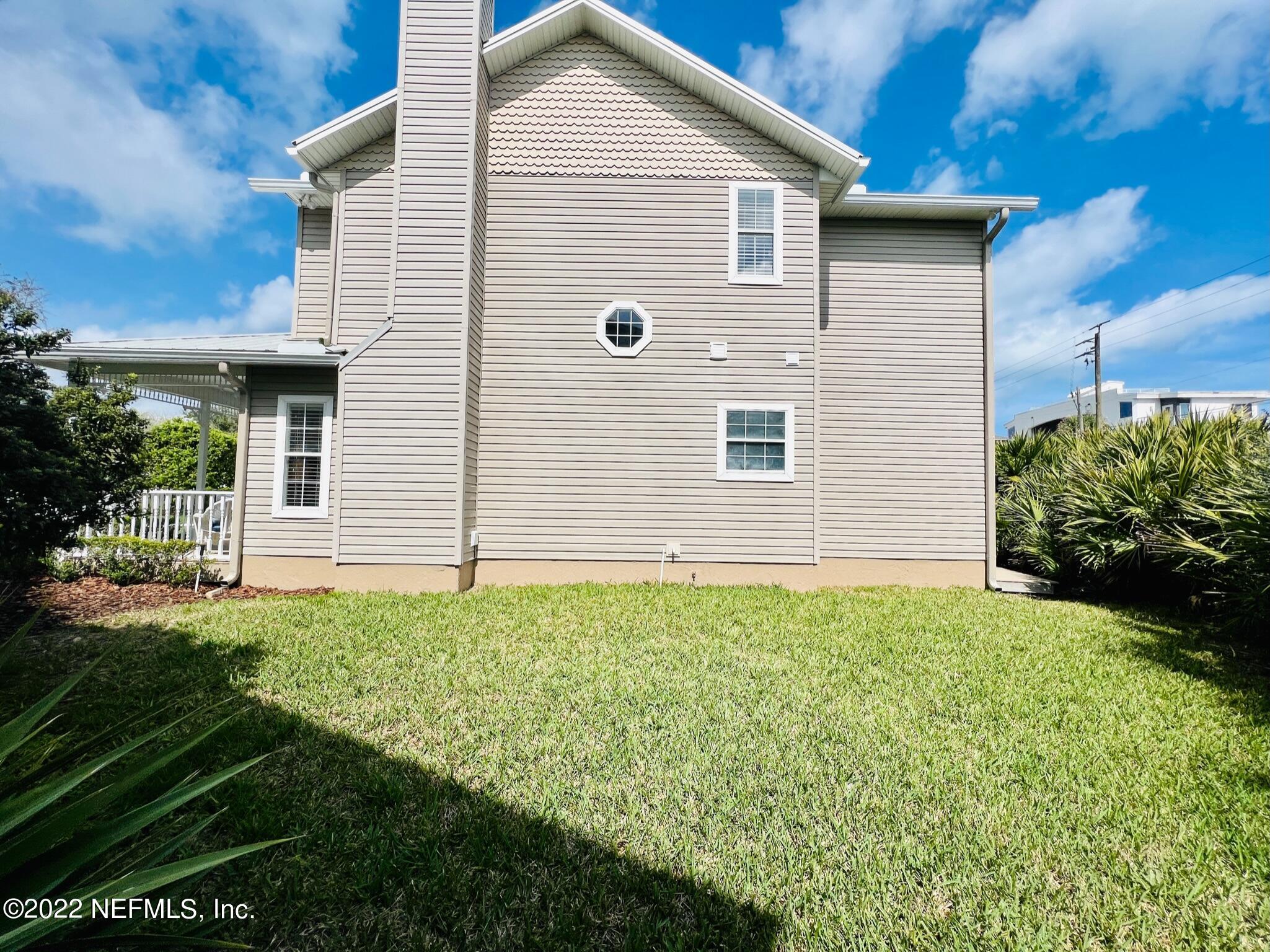 212 Gull Circle Ponte Vedra Beach, FL 32082 - Photo 39 of 49 a view of backyard of house with green space