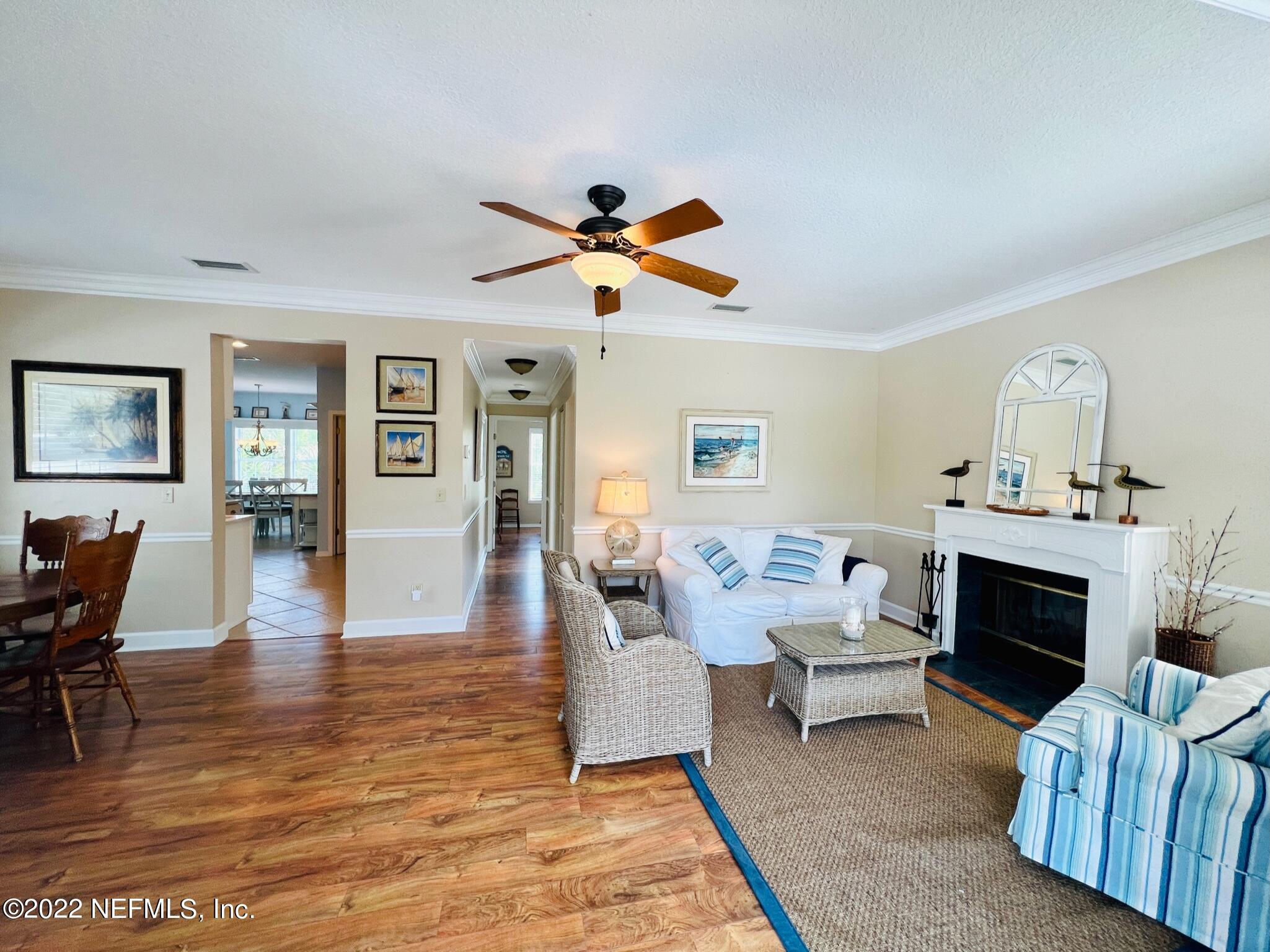 212 Gull Circle Ponte Vedra Beach, FL 32082 - Photo 4 of 49 a living room with furniture and a fireplace