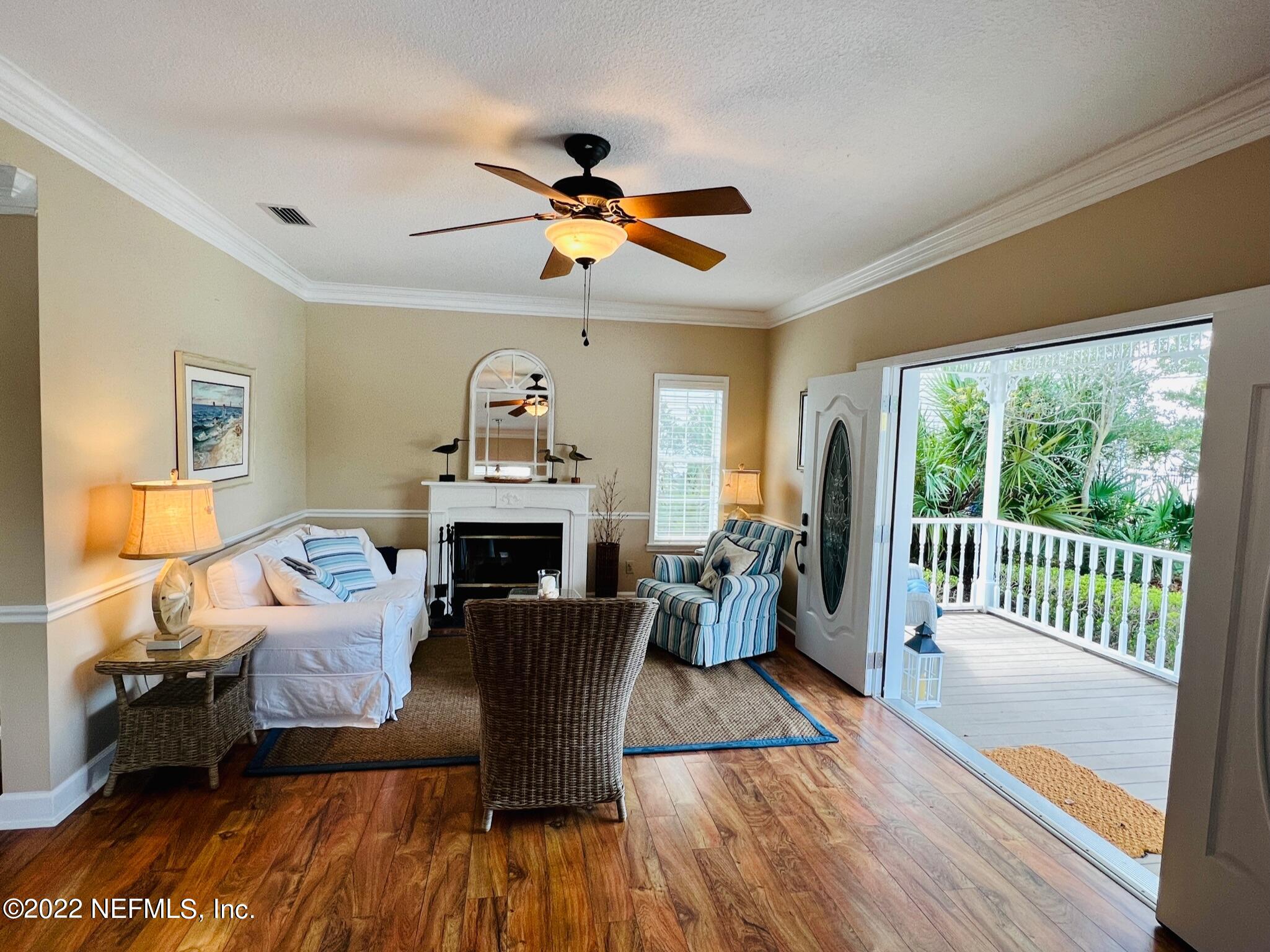 212 Gull Circle Ponte Vedra Beach, FL 32082 - Photo 5 of 49 a living room with furniture and a fireplace