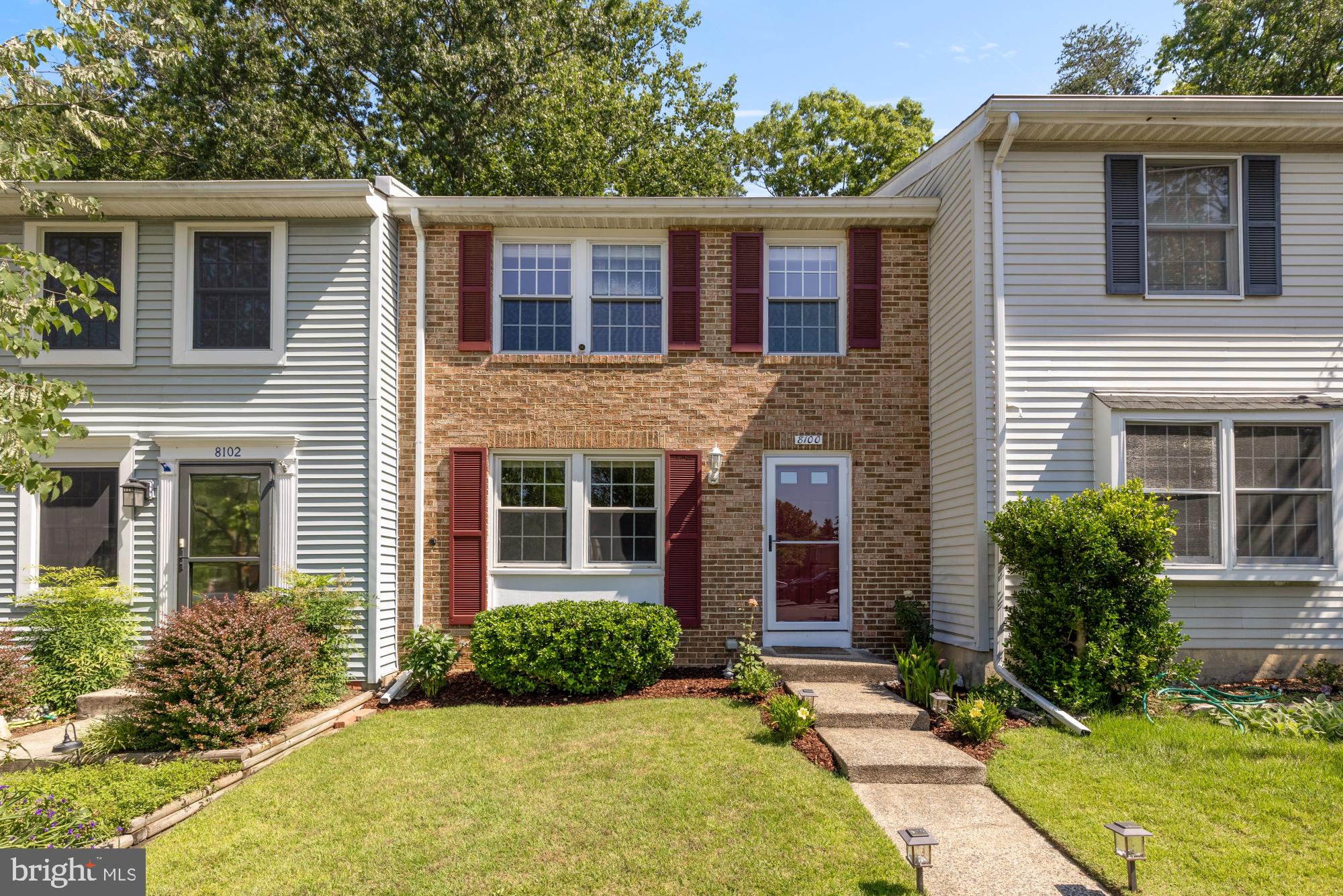 8100 Loving Forest Court Springfield, VA 22153 - Photo 3 of 33 a front view of a house with garden