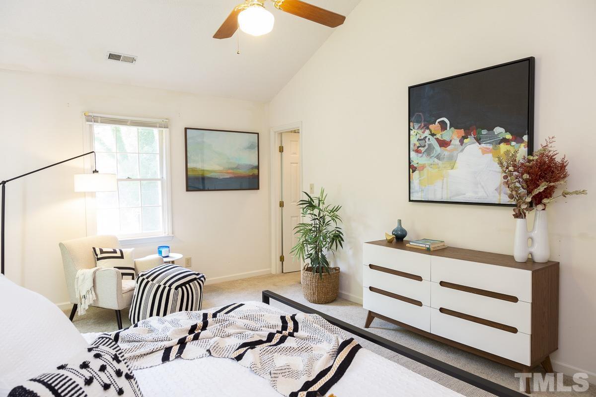 2817 Herring Boulevard Durham, NC 27704 - Photo 18 of 34 a bedroom with furniture and a bed