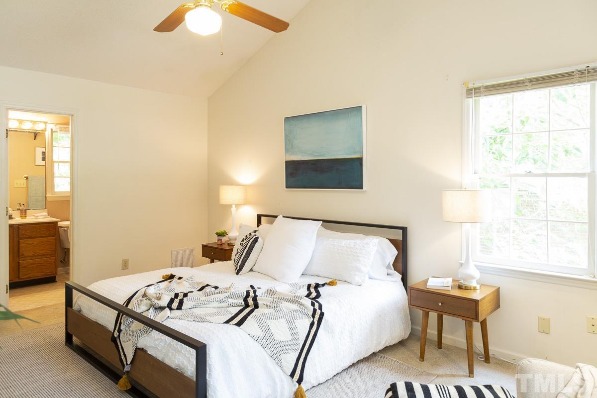 2817 Herring Boulevard Durham, NC 27704 - Photo 19 of 34 a bedroom with a bed and a window