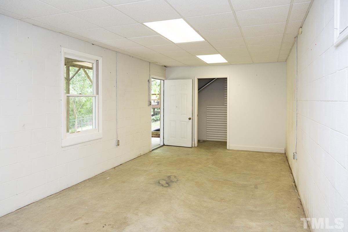 2817 Herring Boulevard Durham, NC 27704 - Photo 31 of 34 an empty room with windows