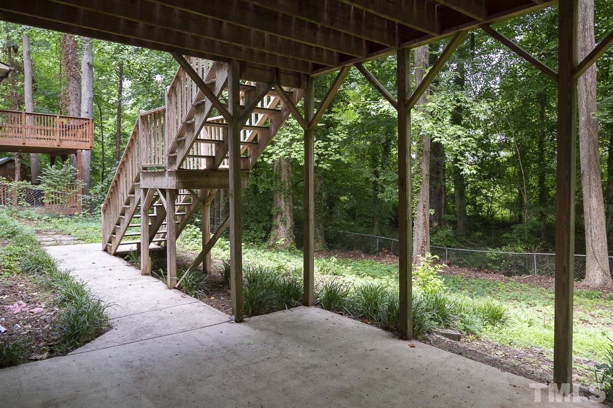 2817 Herring Boulevard Durham, NC 27704 - Photo 32 of 34 a view of a house with backyard and porch
