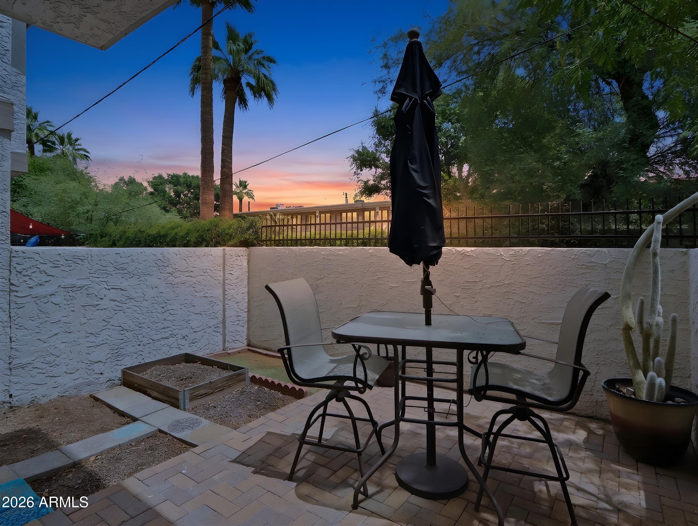 1402 East Osborn Road, Unit 2 Phoenix, AZ 85014 - Photo 24 of 29 a view of a chairs and table in patio