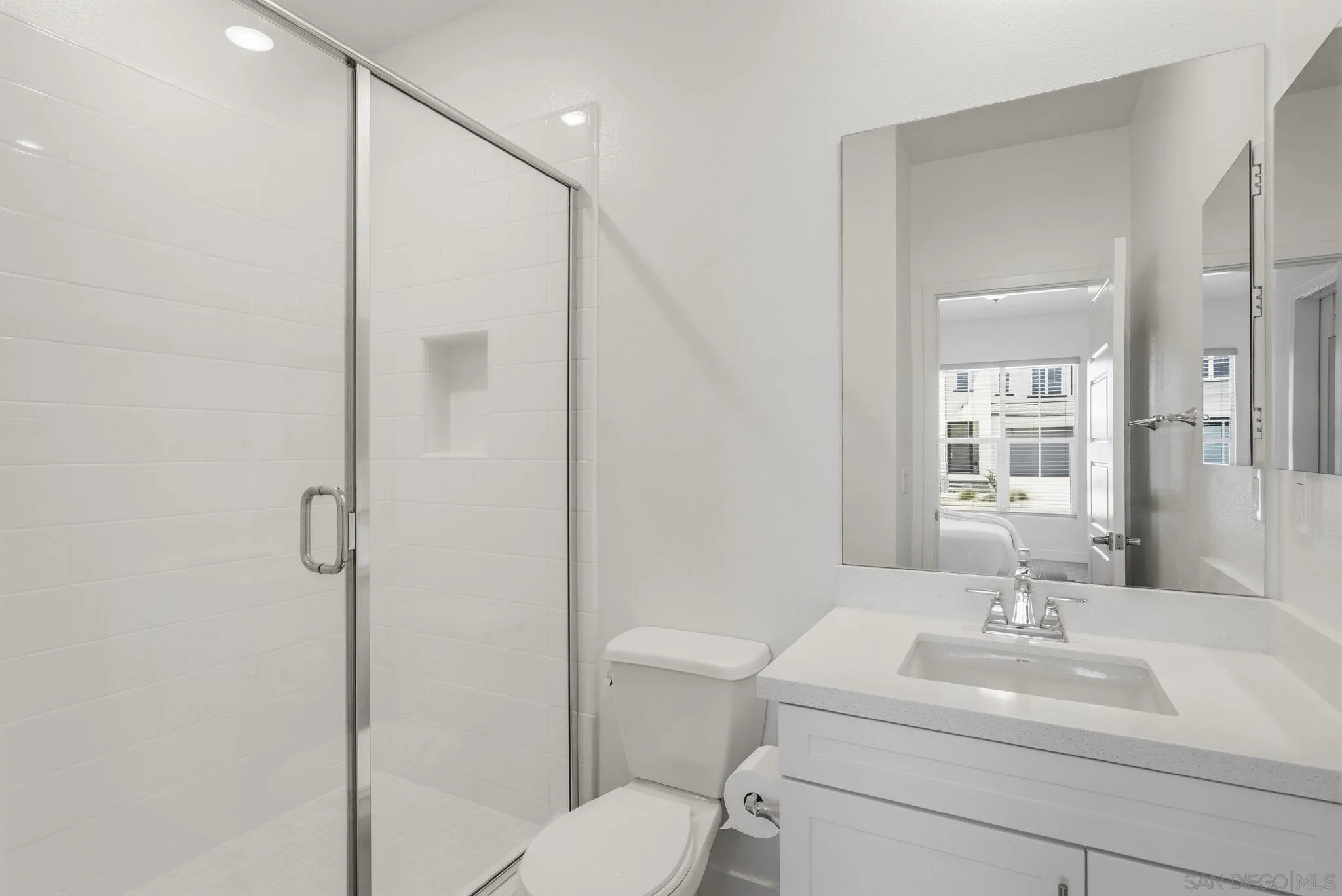 9111 West Bluff Place Santee, CA 92071 - Photo 21 of 36 a bathroom with a sink toilet and shower