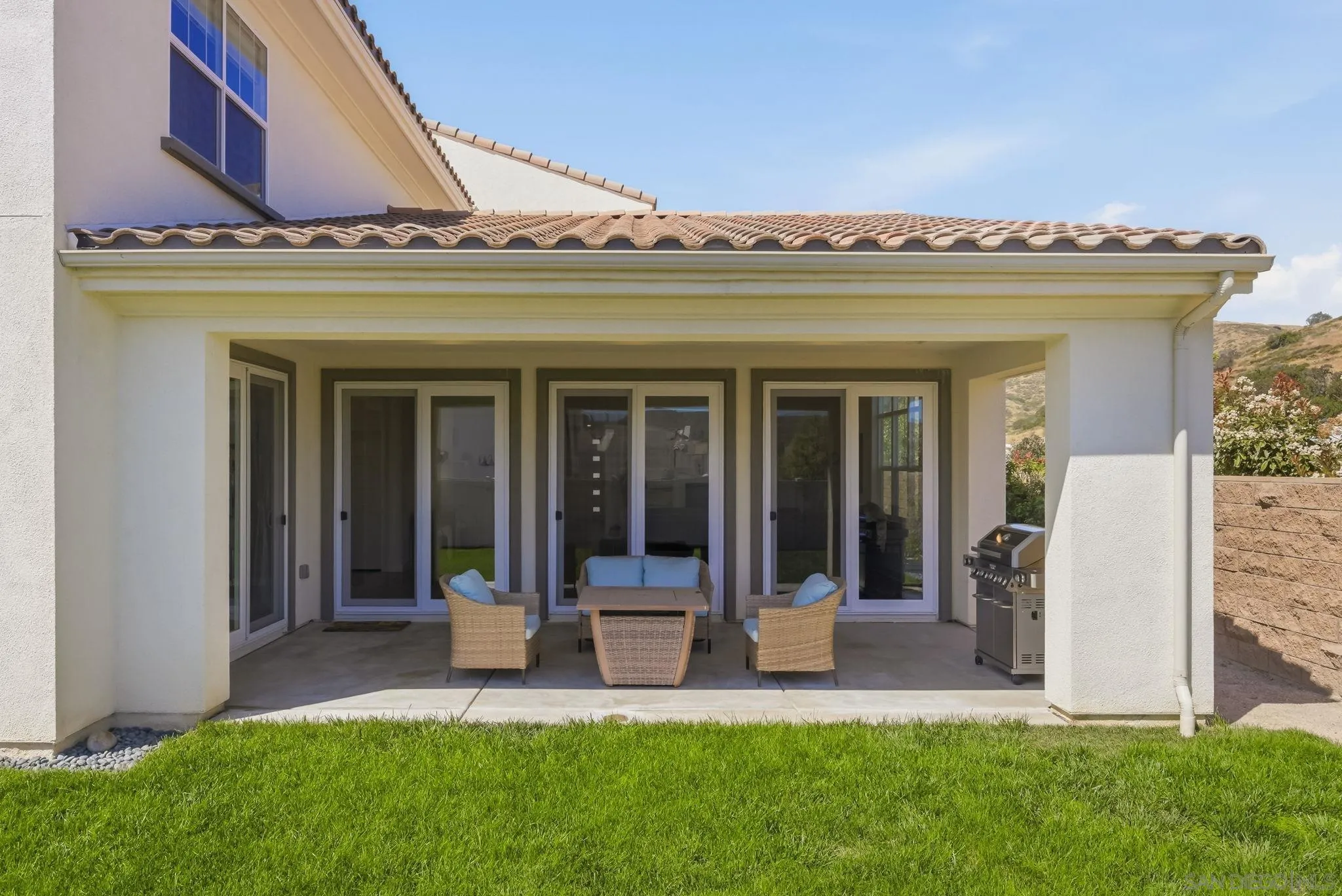 9111 West Bluff Place Santee, CA 92071 - Photo 36 of 36 a view of a house with a garden and patio