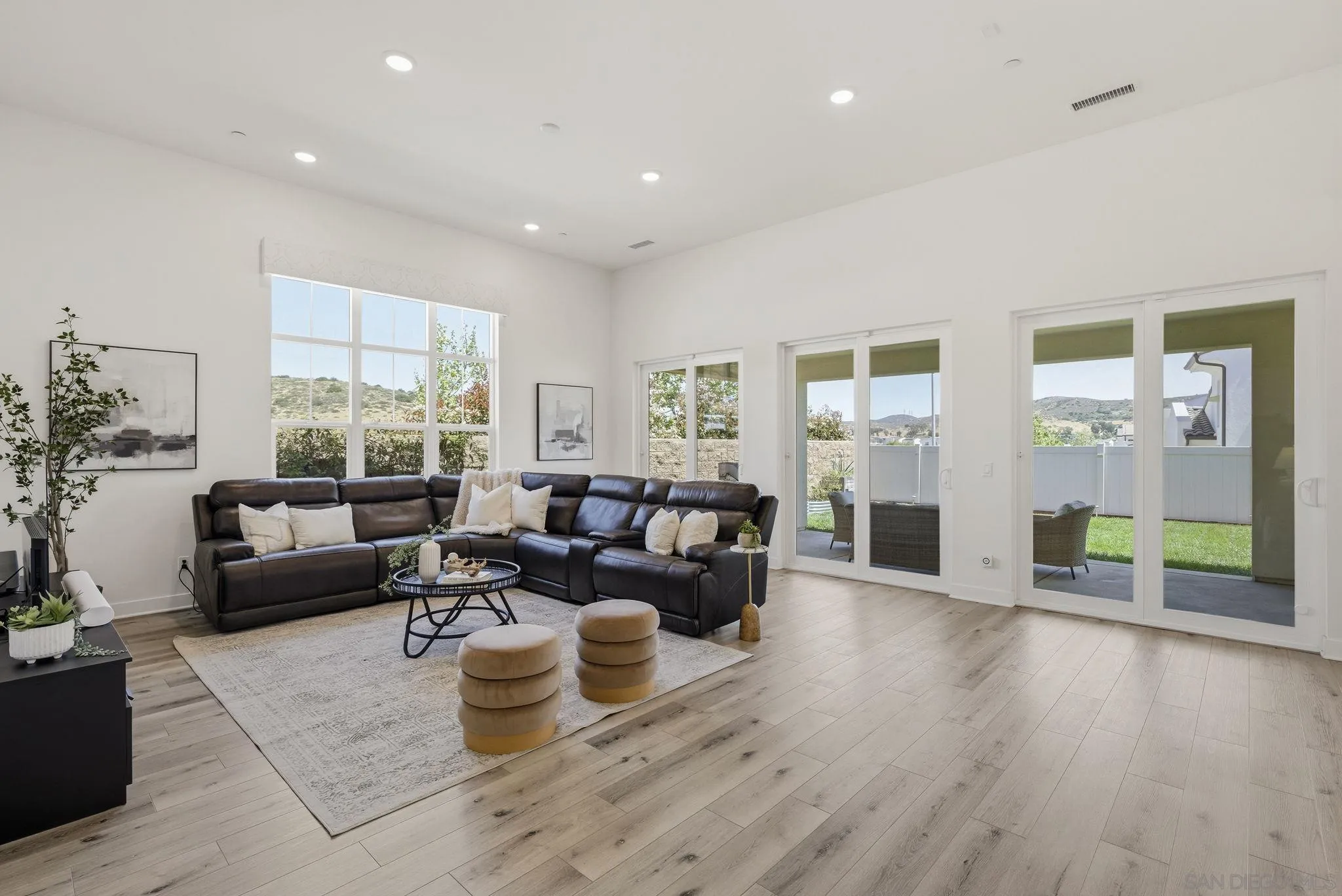 9111 West Bluff Place Santee, CA 92071 - Photo 5 of 36 a living room with furniture or couch and a wooden floor