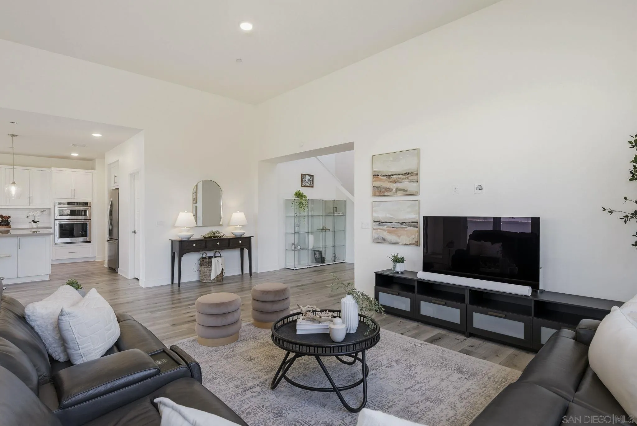 9111 West Bluff Place Santee, CA 92071 - Photo 7 of 36 a living room with furniture and a flat screen tv