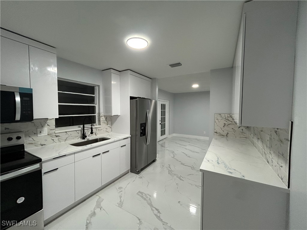 1007 East Jasmine Road Lehigh Acres, FL 33936 - Photo 7 of 31 Gallery Image 7