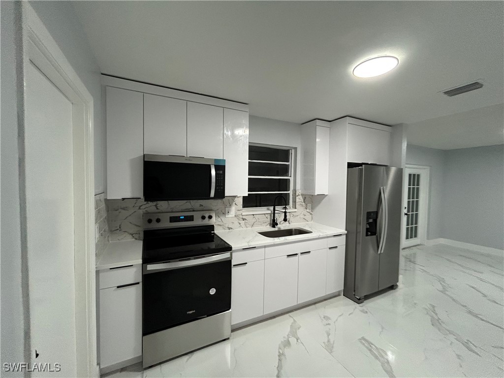 1007 East Jasmine Road Lehigh Acres, FL 33936 - Photo 8 of 31 Gallery Image 8