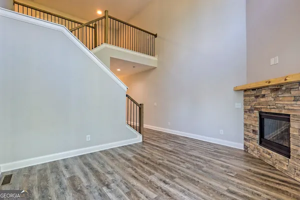 a view of entryway with wooden floor