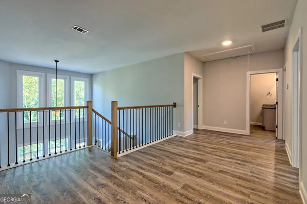 a view of an empty room and window