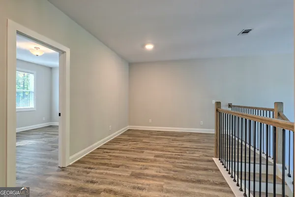 a view of a room with racks on the wall