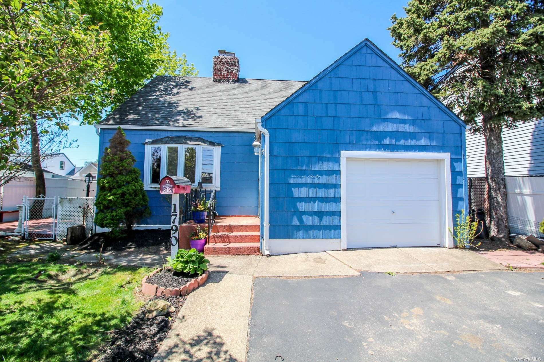 a front view of house with yard