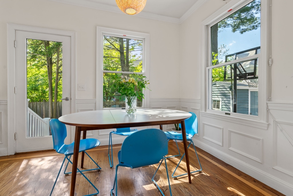 999 Walnut Street Newton, MA 02461 - Photo 13 of 38 a view of a dining room with furniture window and wooden floor