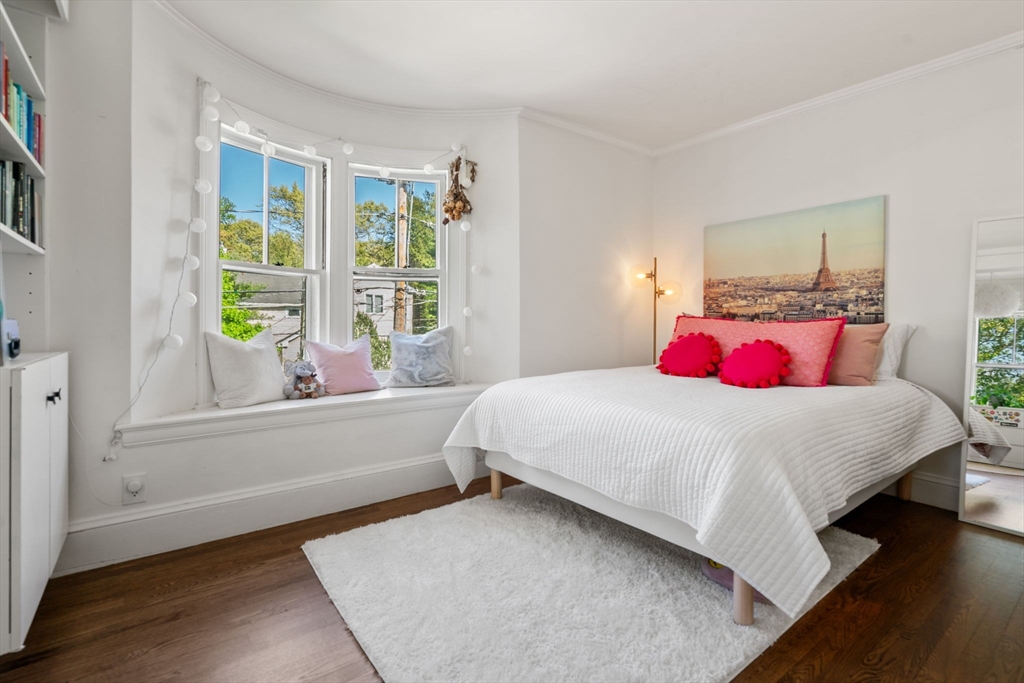 999 Walnut Street Newton, MA 02461 - Photo 19 of 38 a bedroom with a bed and a window