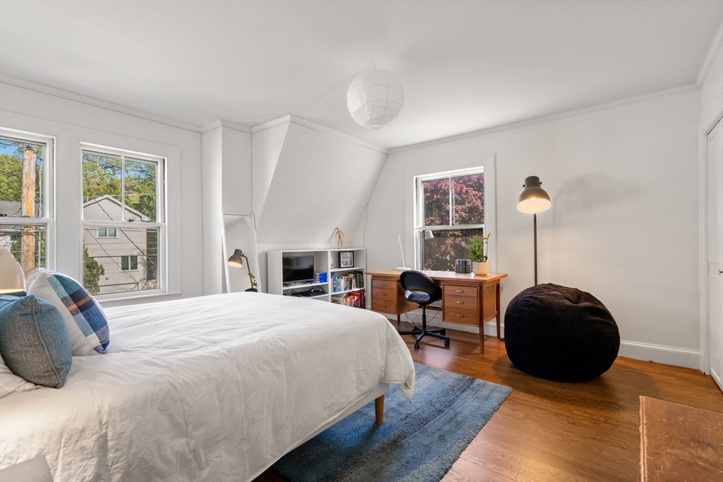 999 Walnut Street Newton, MA 02461 - Photo 21 of 38 a bedroom with a bed and window