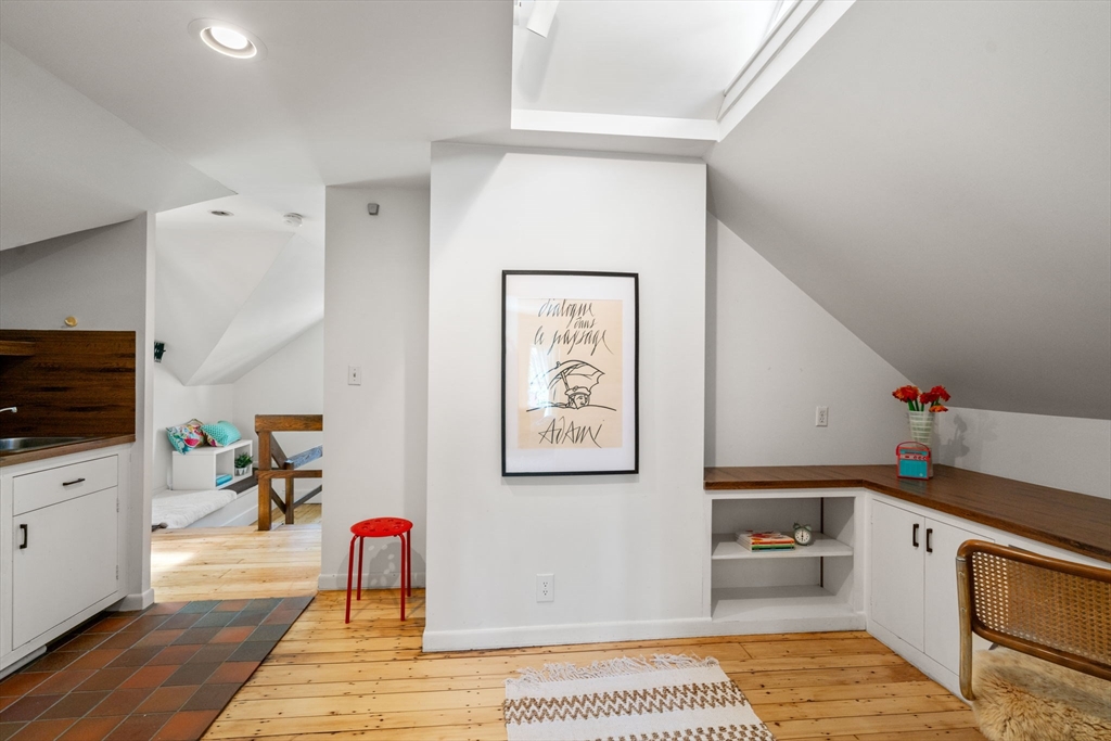 999 Walnut Street Newton, MA 02461 - Photo 30 of 38 a kitchen with a refrigerator and a sink