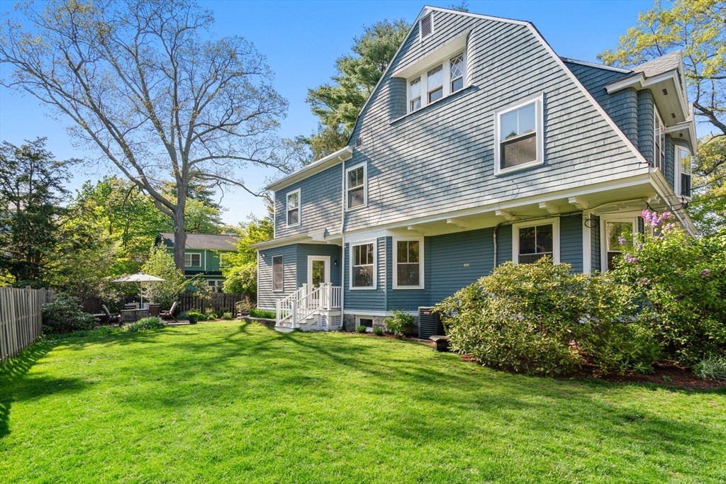 999 Walnut Street Newton, MA 02461 - Photo 33 of 38 a front view of house with yard and green space