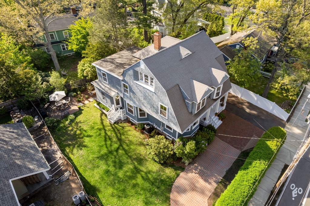 999 Walnut Street Newton, MA 02461 - Photo 36 of 38 a aerial view of a house with a yard