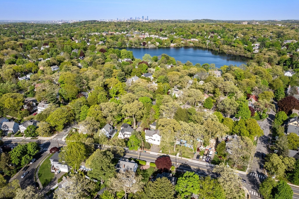 999 Walnut Street Newton, MA 02461 - Photo 37 of 38 a view of a lake with houses in the back