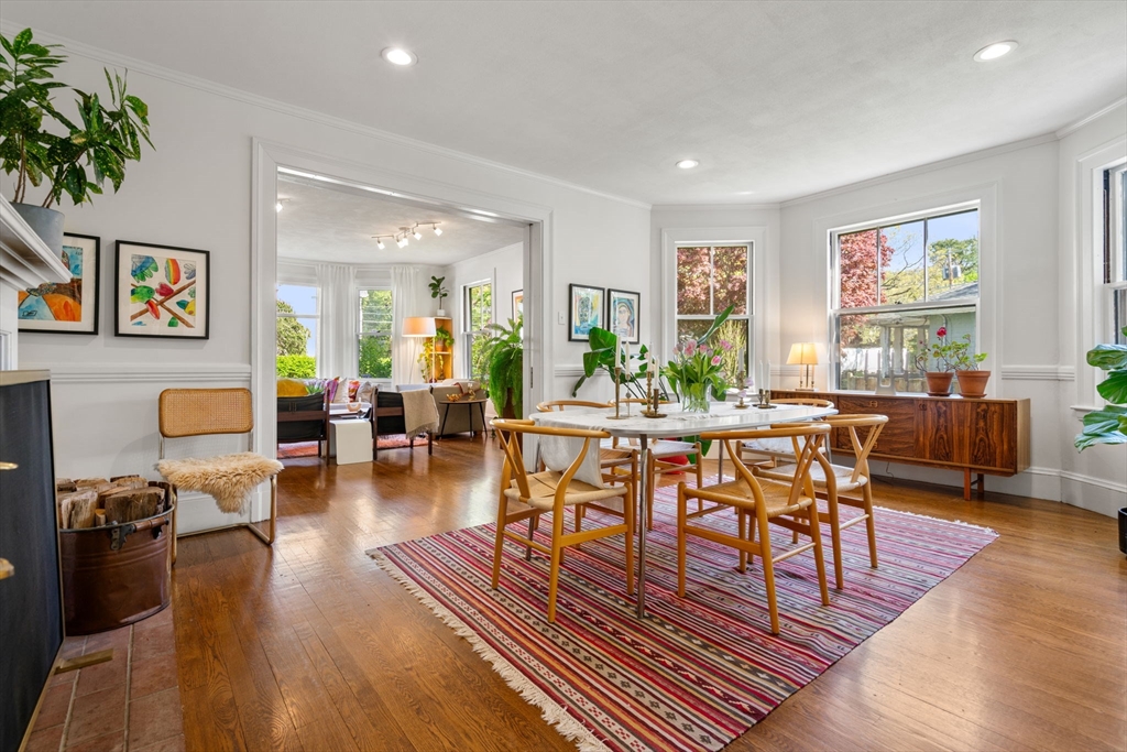 999 Walnut Street Newton, MA 02461 - Photo 10 of 38 a living room with furniture a rug and a large window