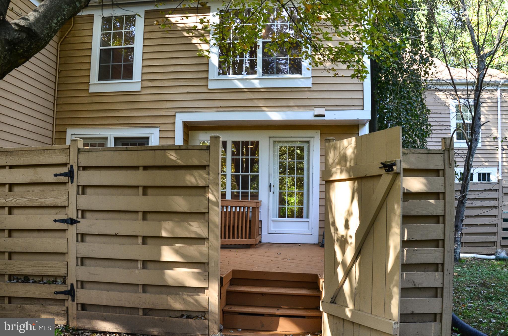 1558 Deer Point Way Reston, VA 20194 - Photo 11 of 22 a front view of a house with a large windows