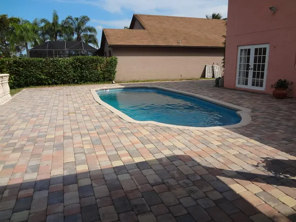 a view of outdoor space yard and swimming pool