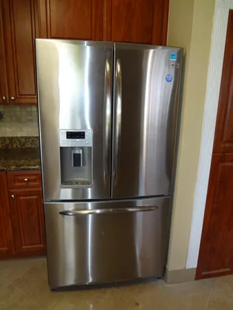 a close view of refrigerator a sink