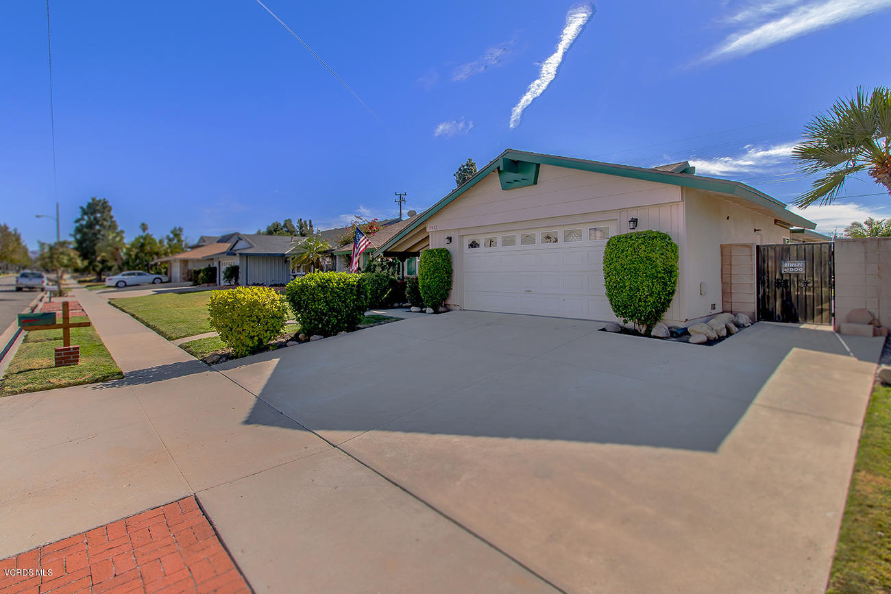 2942 Racine Street Simi Valley, CA 93065 - Photo 3 of 37 a swimming pool with outdoor seating and yard