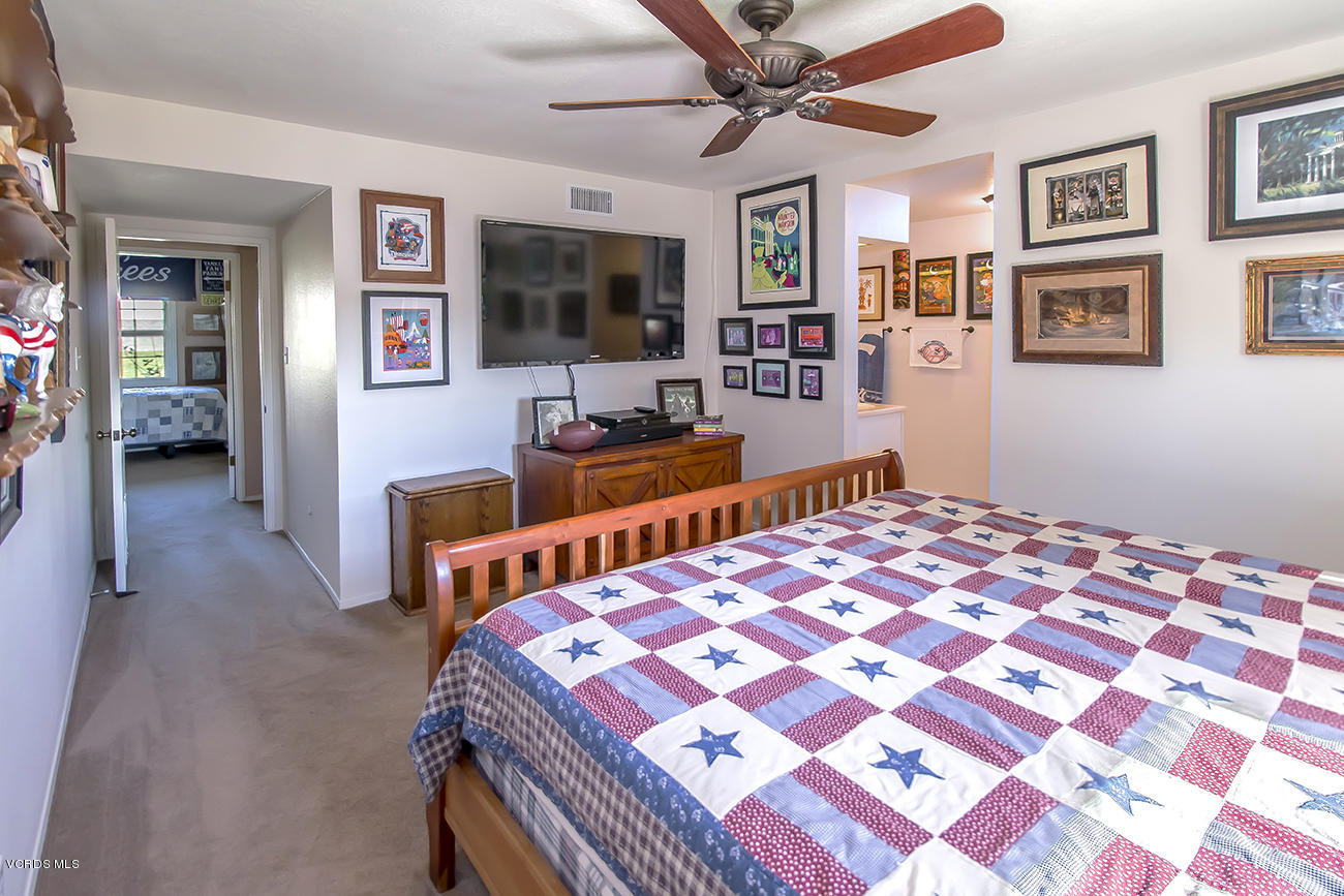 2942 Racine Street Simi Valley, CA 93065 - Photo 26 of 37 a bedroom with furniture and a flat screen tv