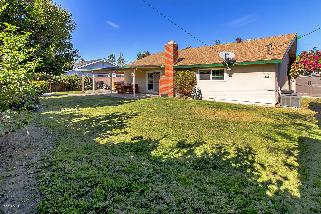 2942 Racine Street Simi Valley, CA 93065 - Photo 30 of 37 a front view of a house with a garden