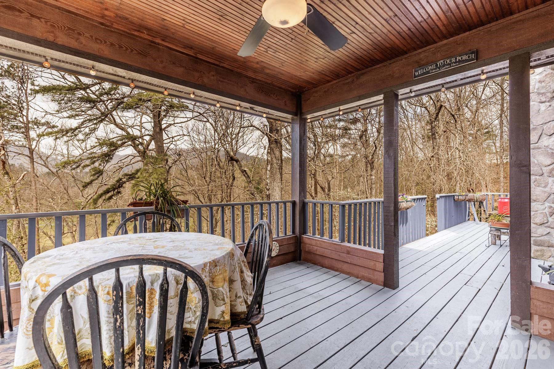 97 Covered Bridge Road Robbinsville, NC 28771 - Photo 13 of 45 a view of a balcony with wooden floor