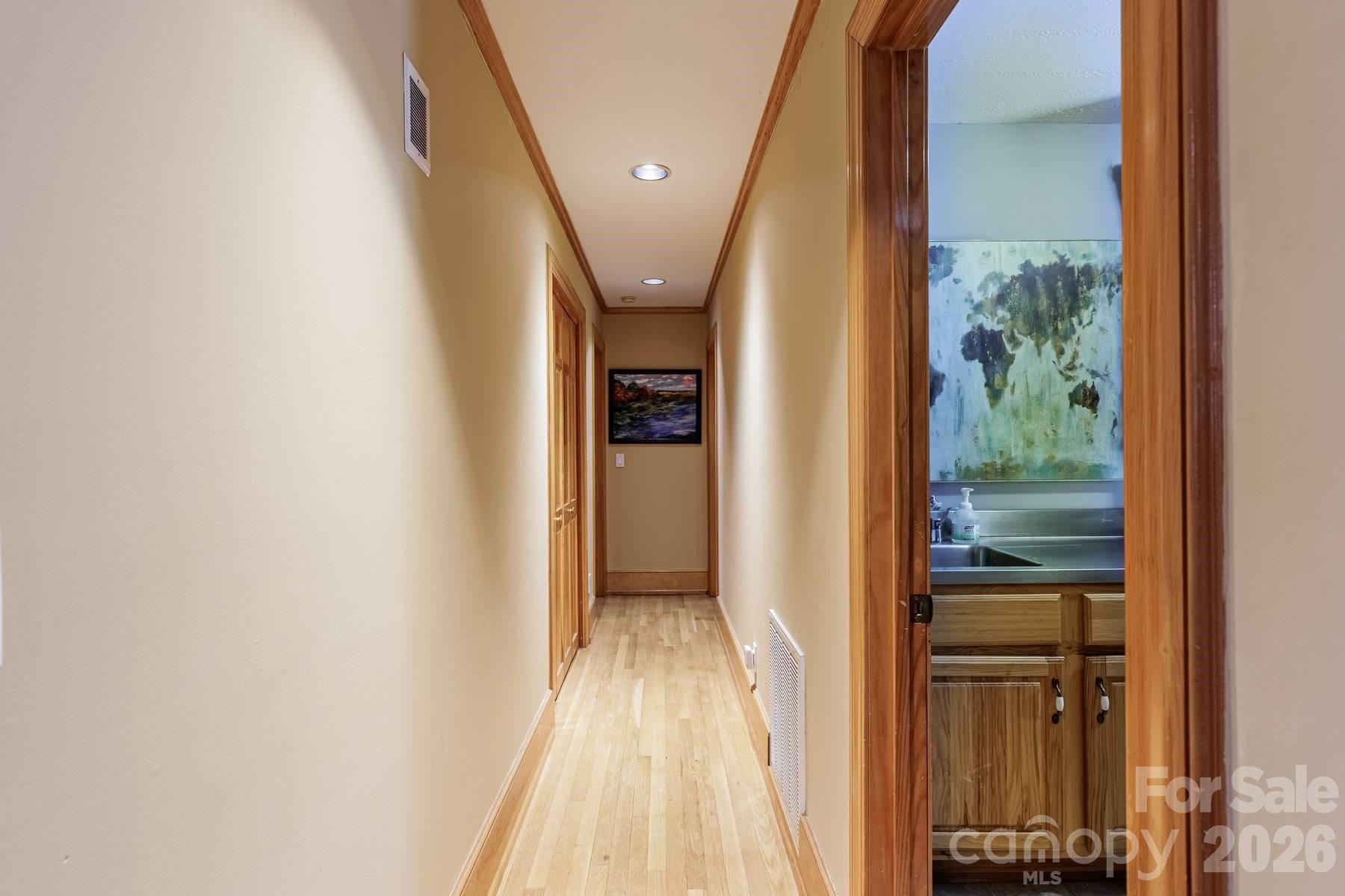 97 Covered Bridge Road Robbinsville, NC 28771 - Photo 17 of 45 a view of a hallway with wooden floor and entryway