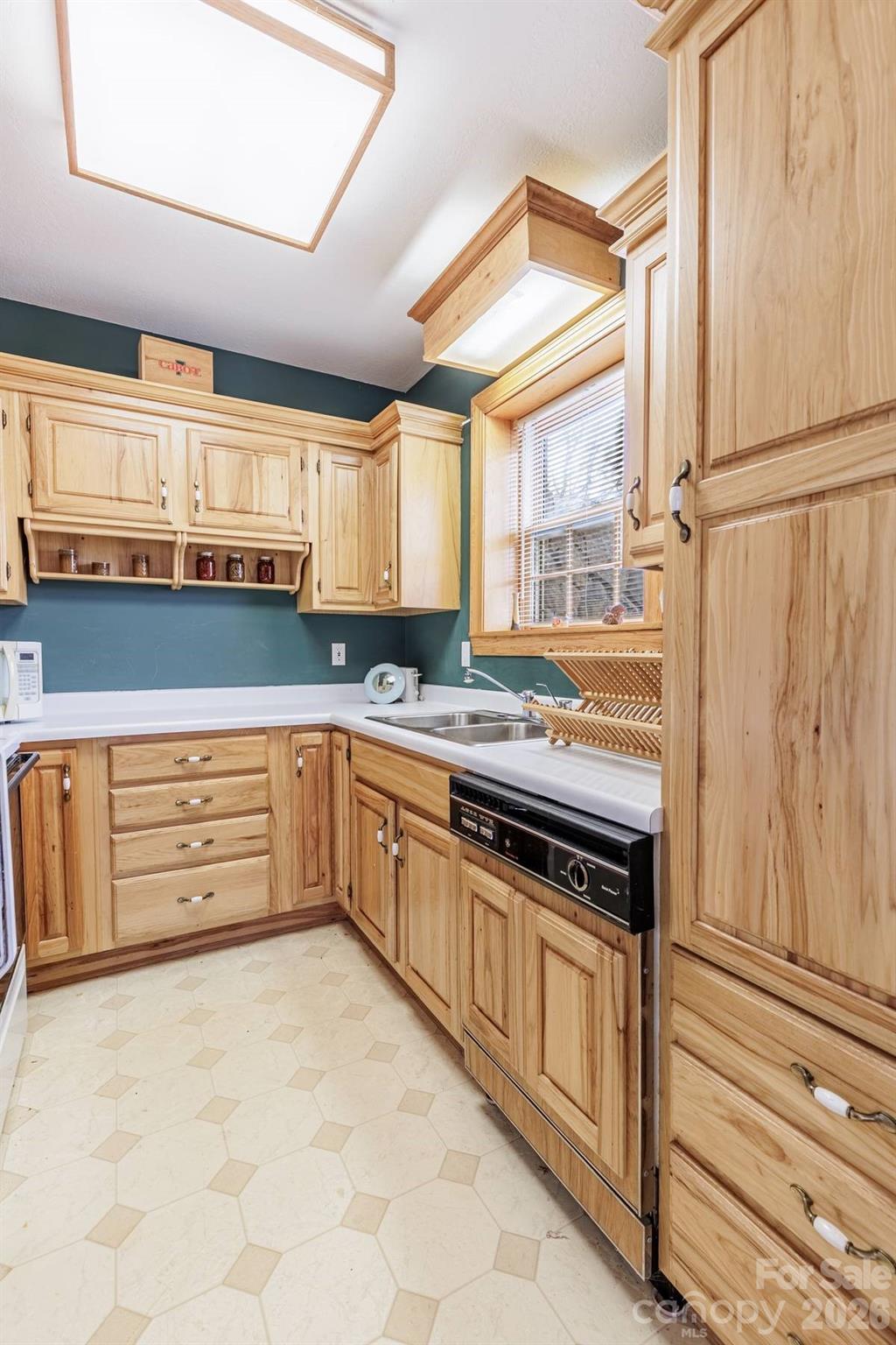 97 Covered Bridge Road Robbinsville, NC 28771 - Photo 30 of 45 a kitchen with stainless steel appliances a stove and a refrigerator