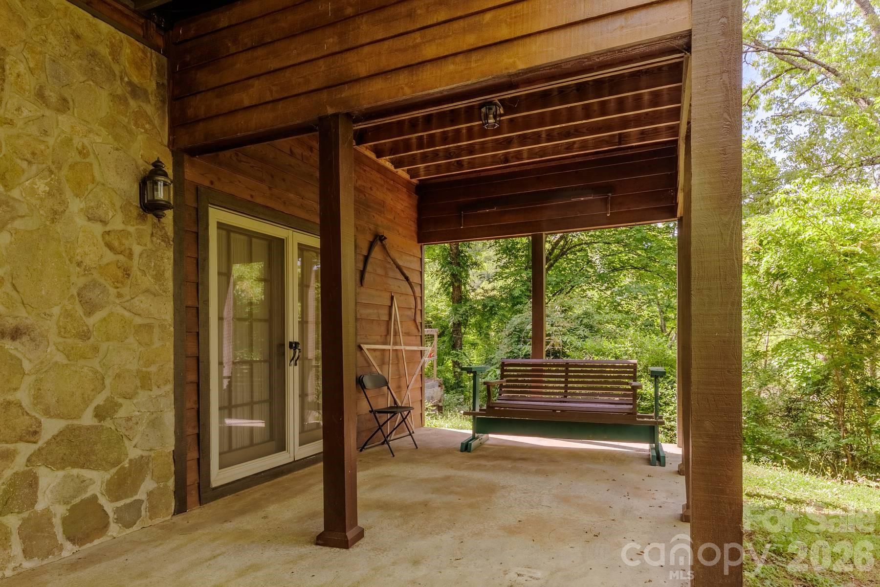 97 Covered Bridge Road Robbinsville, NC 28771 - Photo 34 of 45 a view of outdoor space deck and window