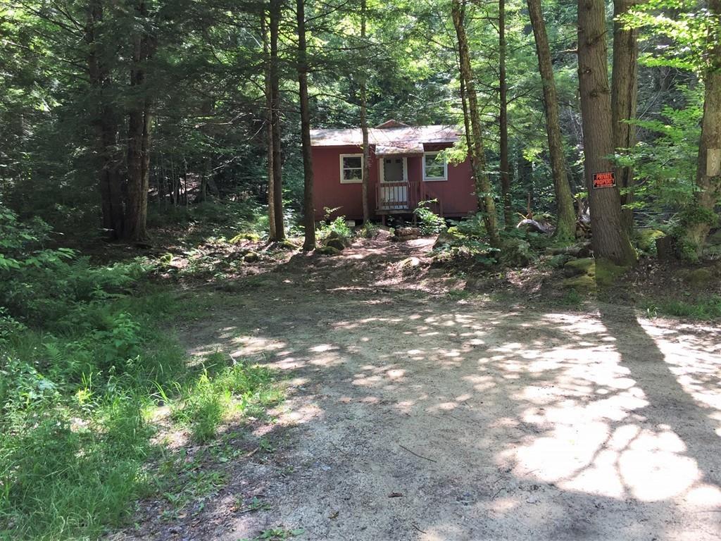 69 Kentfield Road Wendell, MA 01379 - Photo 1 of 9 a view of a house with a yard