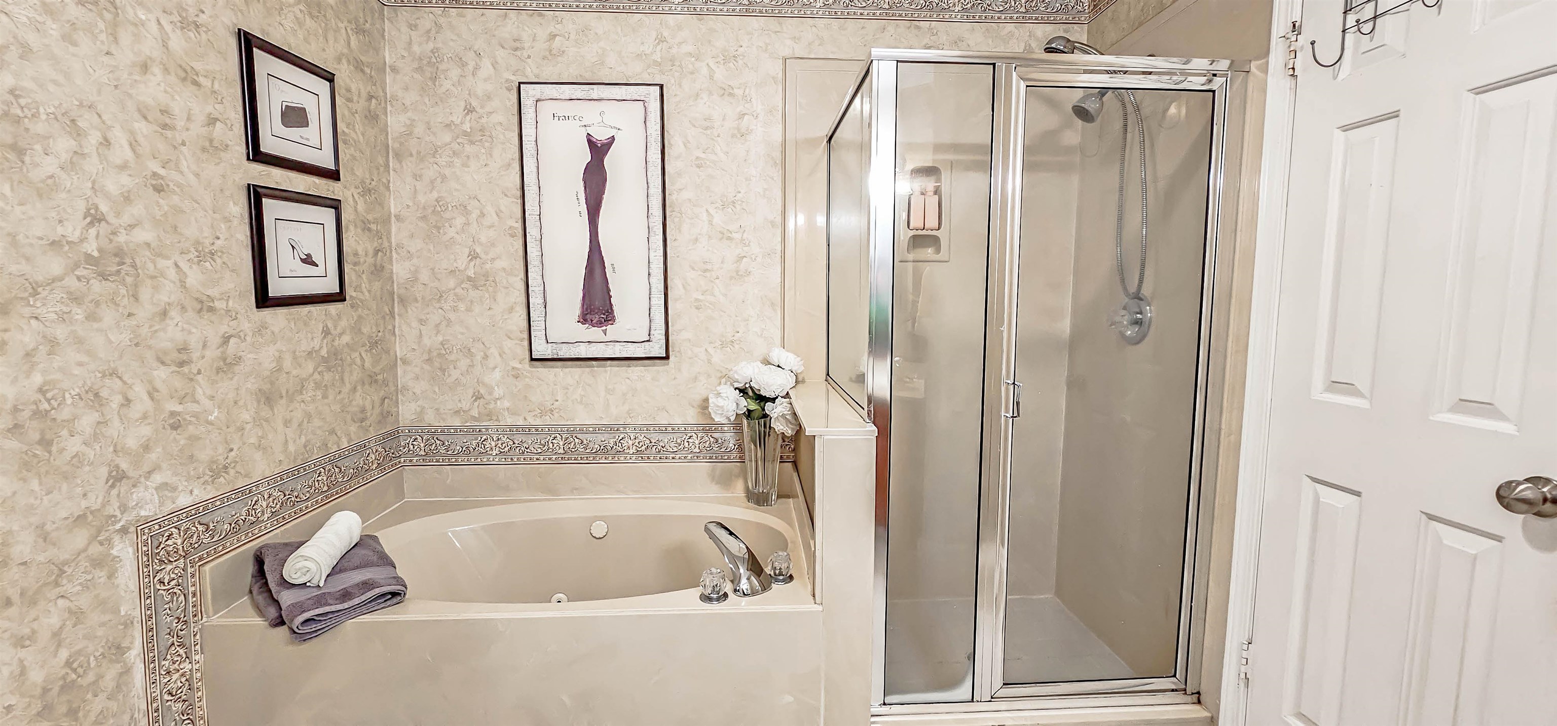 251 Summit View Cove Collierville, TN 38017 - Photo 20 of 30 a bathroom with a bathtub and a shower