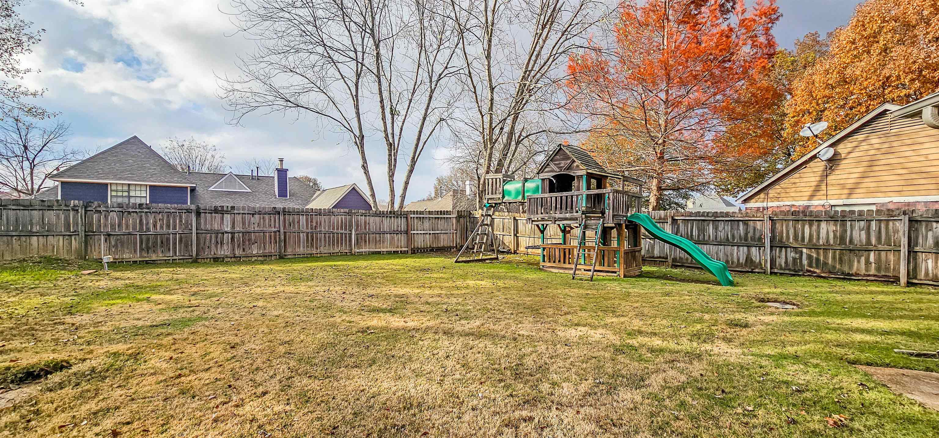 251 Summit View Cove Collierville, TN 38017 - Photo 27 of 30 a view of a house with a yard and sitting area