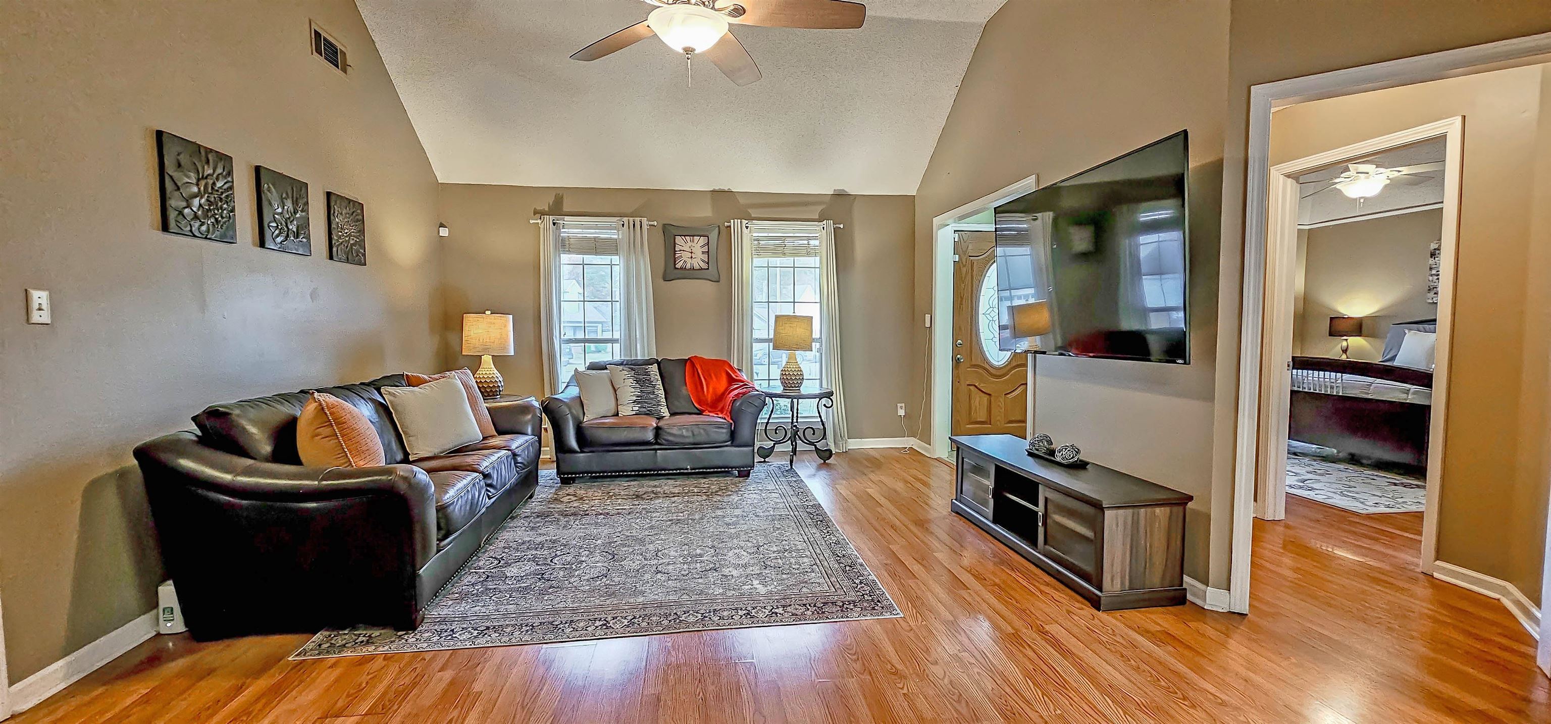 251 Summit View Cove Collierville, TN 38017 - Photo 4 of 30 a living room with furniture rug and wooden floor