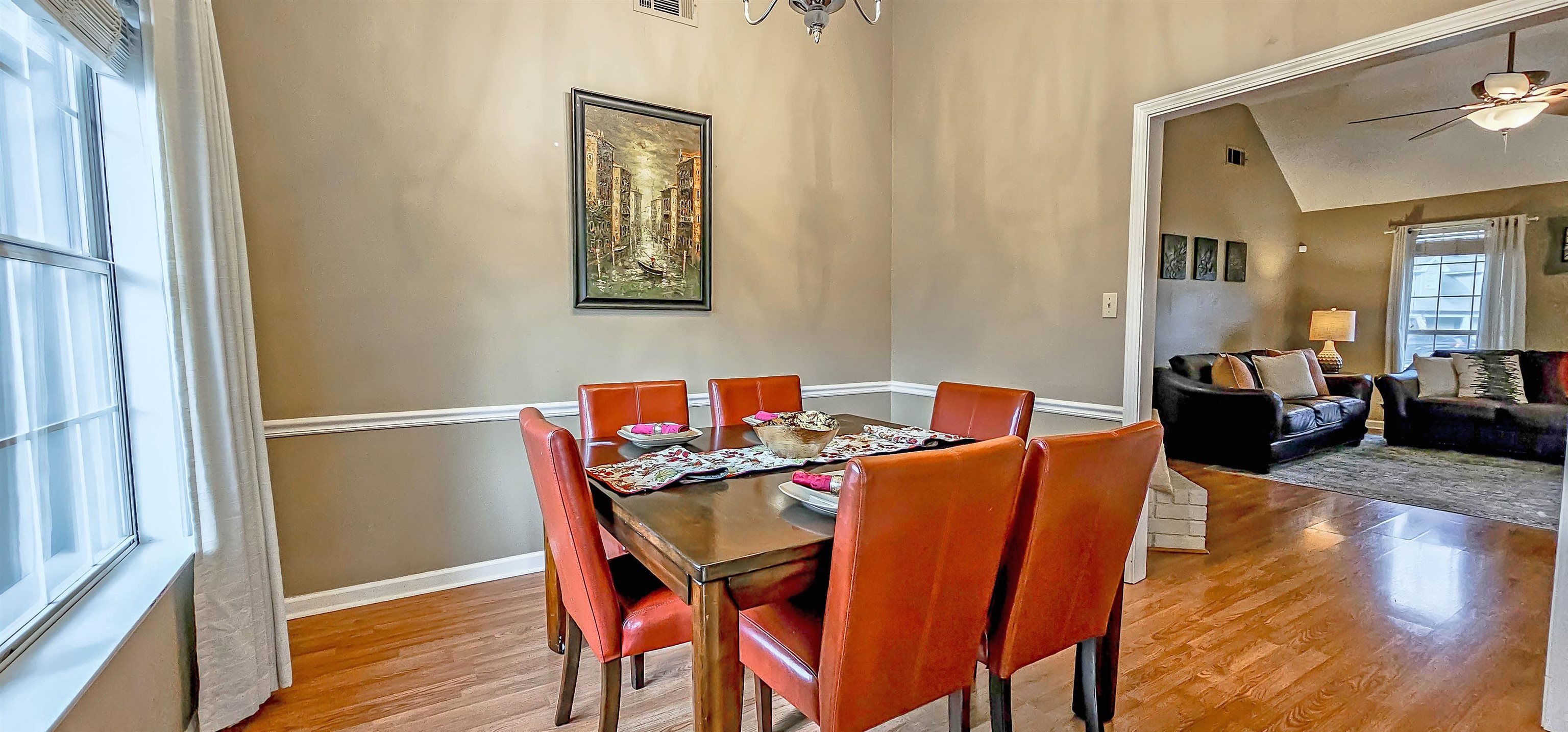 251 Summit View Cove Collierville, TN 38017 - Photo 9 of 30 a view of a dining room with furniture and wooden floor