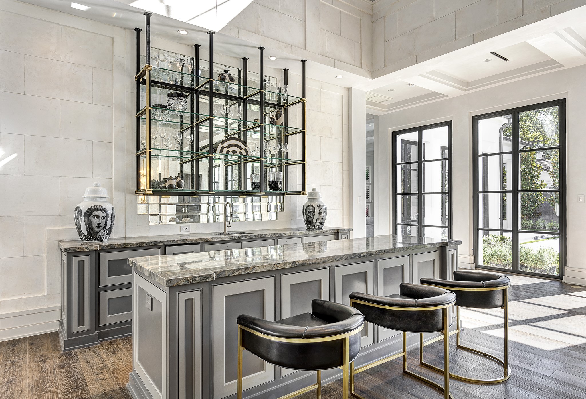 626 Rocky River Road Houston, TX 77056 - Photo 13 of 22 a kitchen with a cabinets and chairs