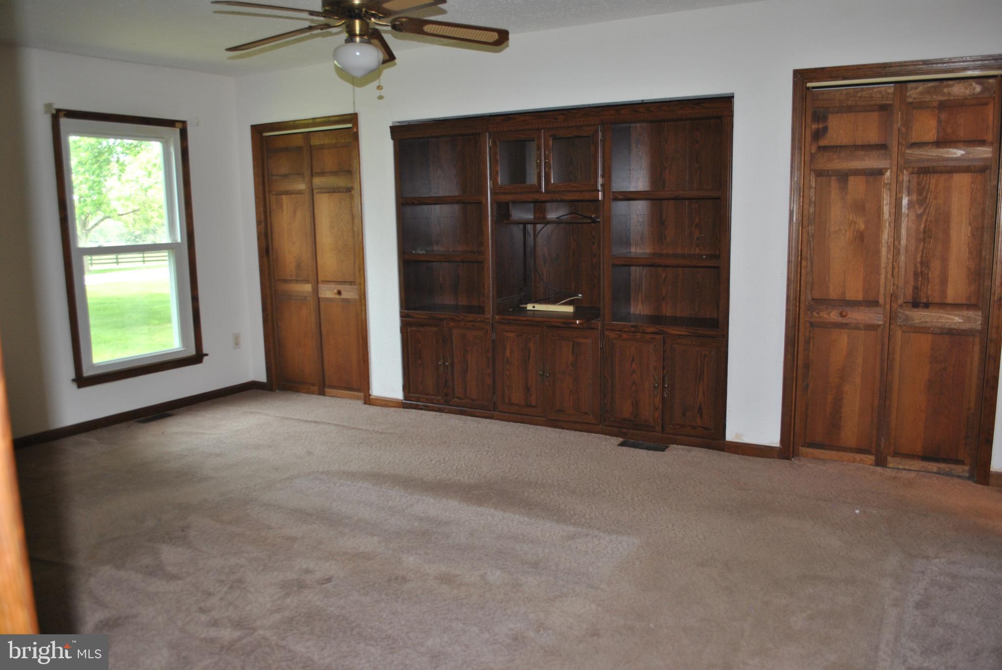 7313 Covingtons Corner Road Bealeton, VA 22712 - Photo 13 of 22 Primary Bedroom w/built in entertainment cabinet